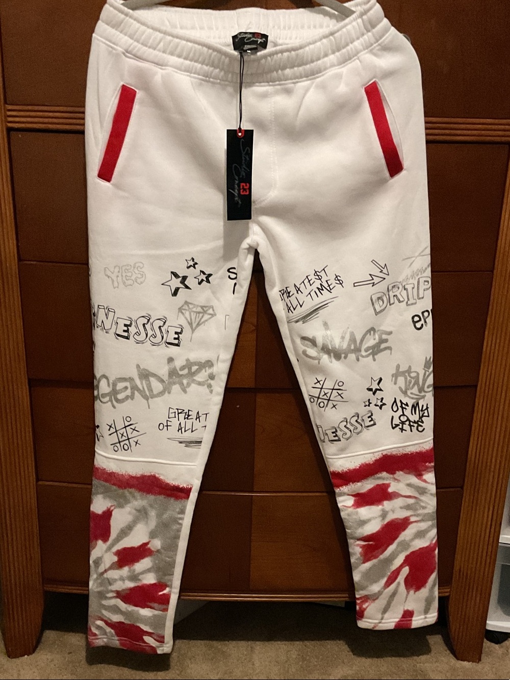 Studio White Jogger Pants with Red Accents and Gray Graffiti